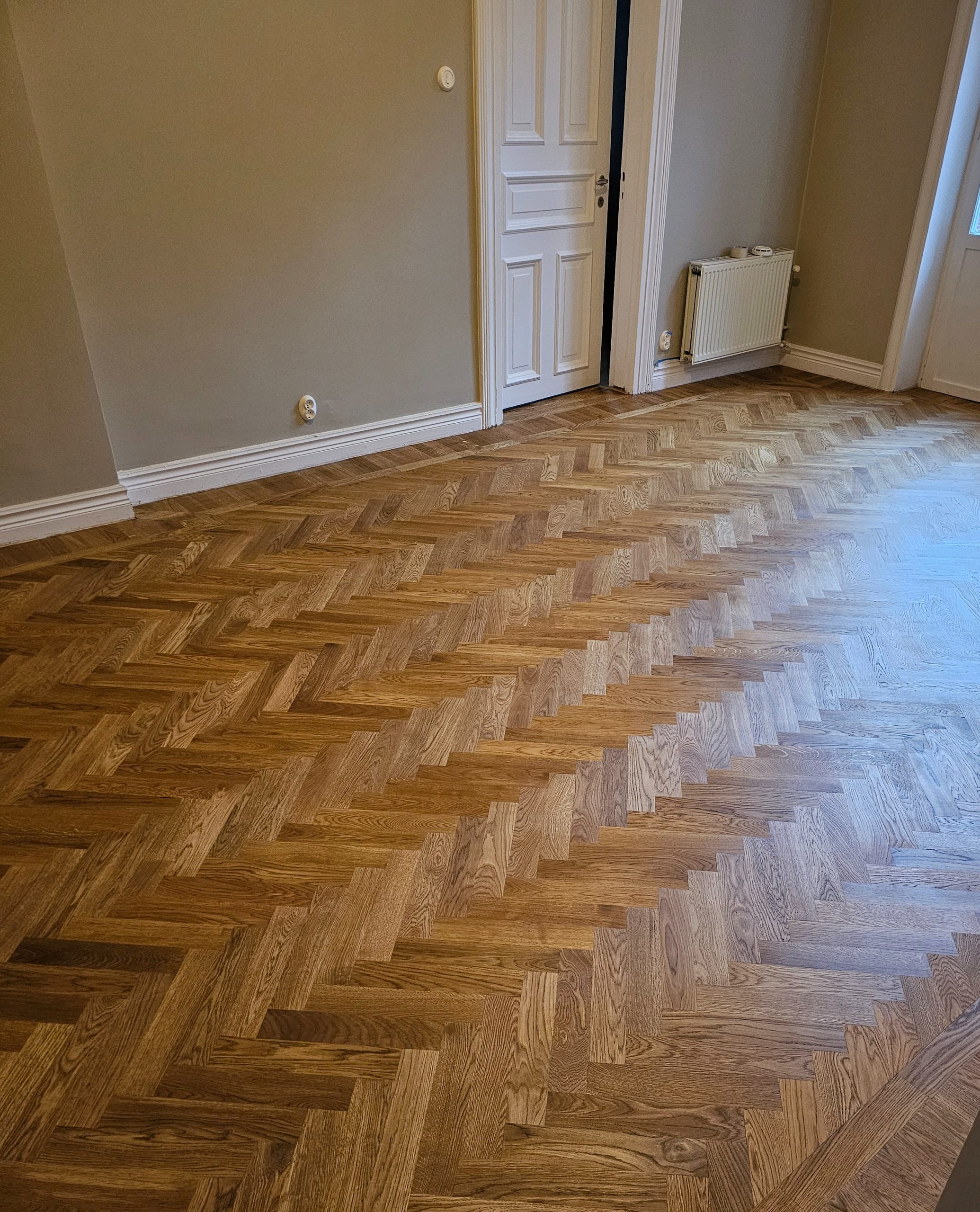 Finished European oak herringbone floor with Pallmann Magic Oil 2K Sand in Malmö
